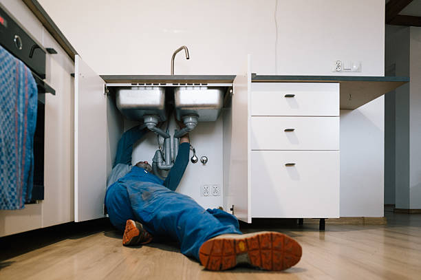 Professional Drain Cleaning technician working in Felton, DE